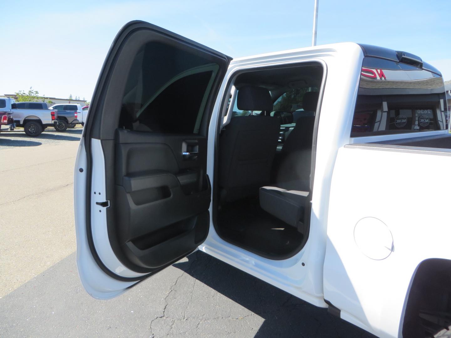 2018 White /BLACK Chevrolet Silverado 1500 LT (3GCPCREC7JG) with an 5.3L V8 OHV 16V engine, automatic transmission, located at 2630 Grass Valley Highway, Auburn, CA, 95603, (530) 508-5100, 38.937893, -121.095482 - Must see Pre Runner.... CST front lift spindals, Camburg UCA's, King Adjustable 2.5 Coil-overs, King 2.5 rear shocks, 35" Toyo RT Trail tires, 17" Method Race wheels, MZ front skid plate, G2 rear differntail cover, Full size bed mounted spare tire, Black Vinyl roof wrap, smoke tail lights and 3rd br - Photo#37